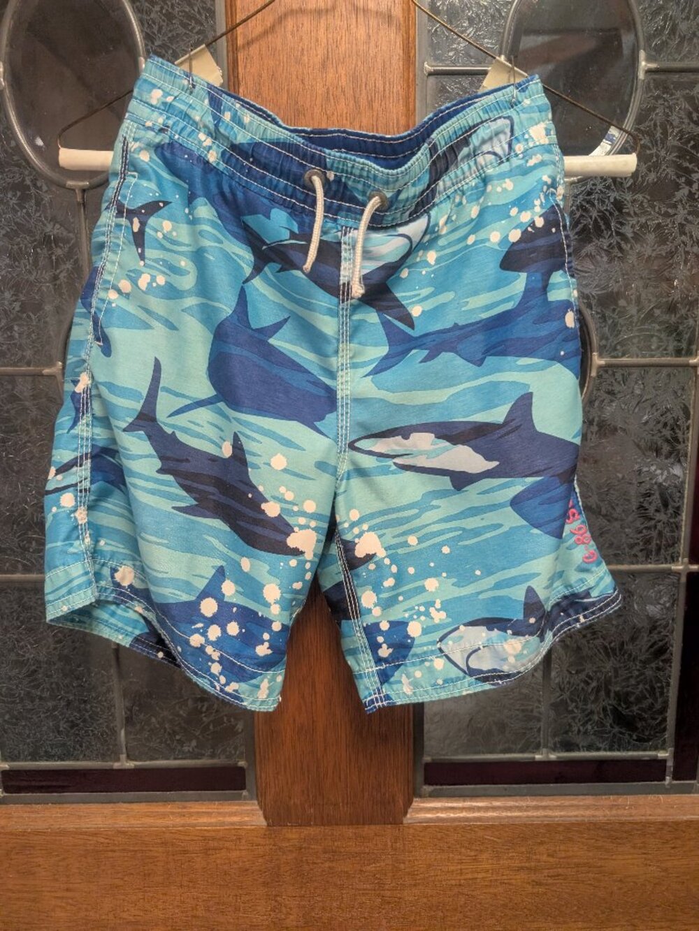 Boys Blue swim shorts, size 6/7
